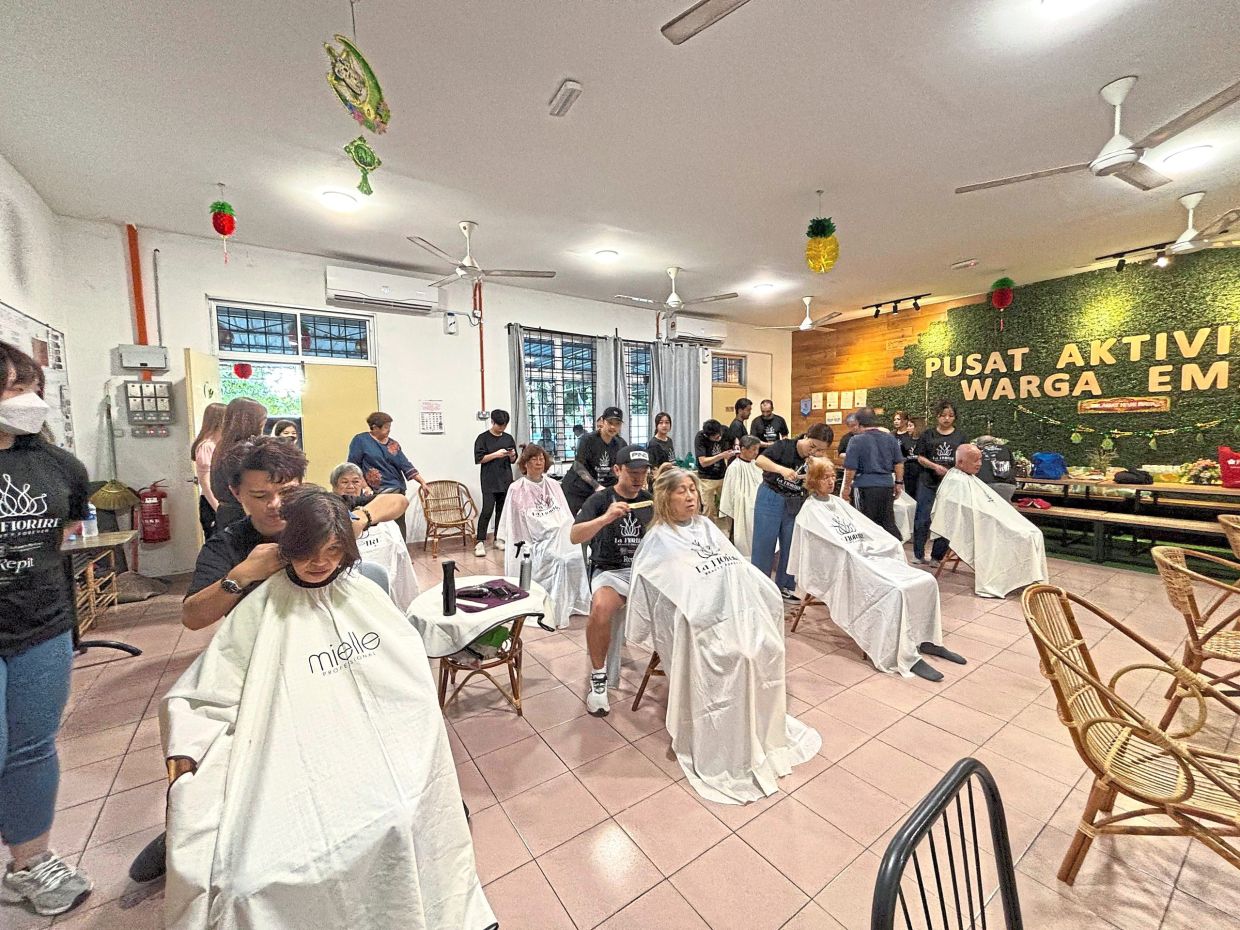 Left: Free haircut programme at Pusat Aktiviti Warga Emas Segambut.