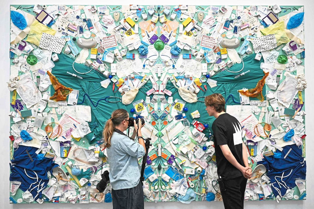 An artwork titled Hazardous Material by Hirst is seen at the Newport Street Gallery in London.