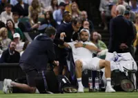 Tennis-Dimitrov marks return from pectoral injury with win in Paris