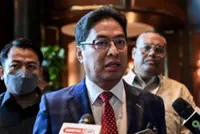 Muhyiddin's son-in-law is most likely using a foreign passport, says Azam