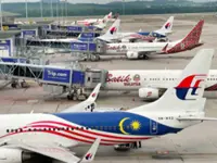 Airlines have full discretion to decide on serving alcohol on board, says Transport Minister