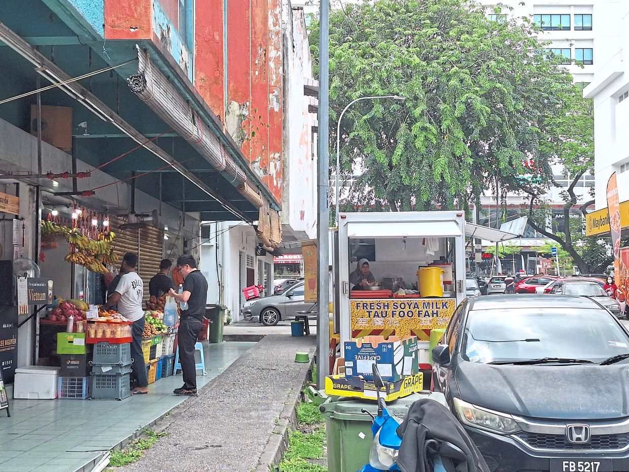 A food truck in the Section 14 commercial area, near the entrance to the market and food court complex.