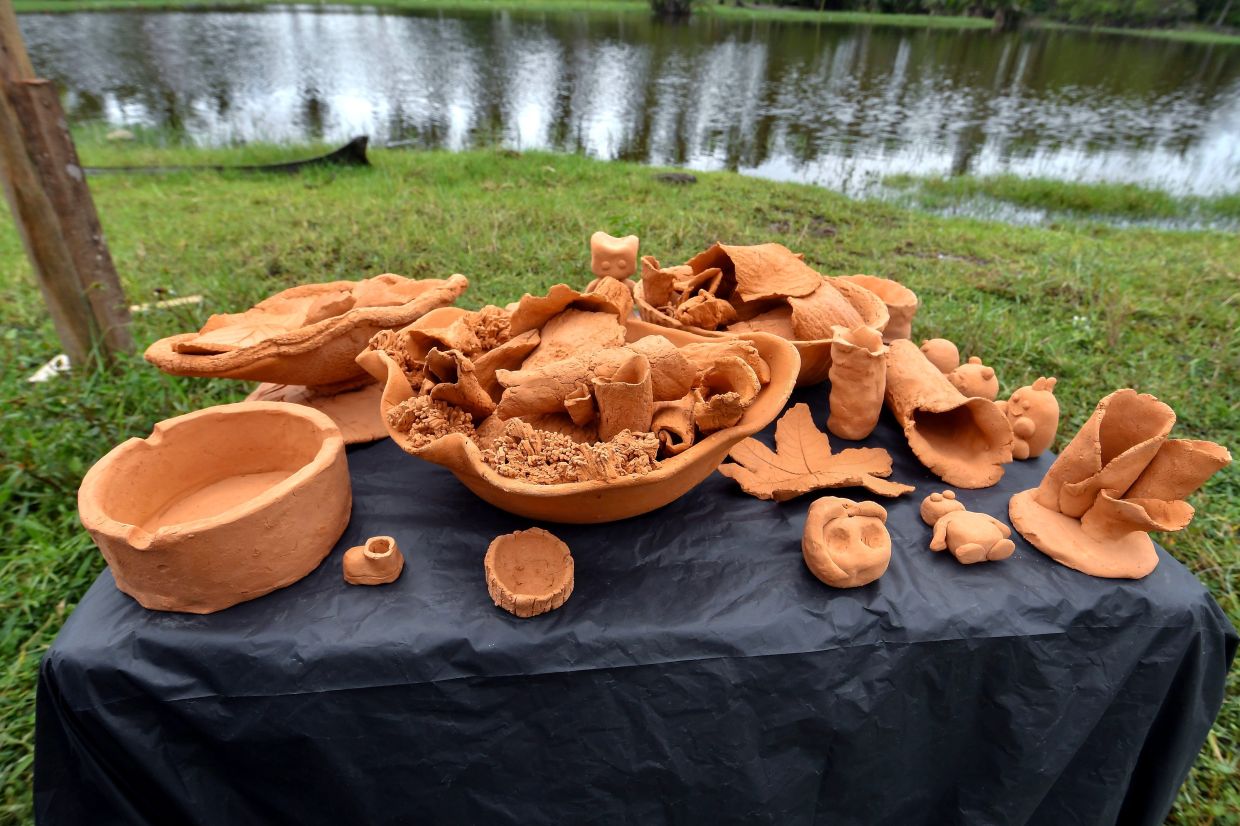Clay sculptures are displayed at the 'After Monsoon Project: Tera-Kota' programme at Pantai Pulau Kundur. Photo: Bernama 