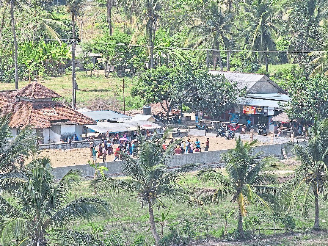 Life on Buwun Mas is slow and peaceful, but things may change once the resort is built and tourists start coming. — AHMAD PATHONI/dpa