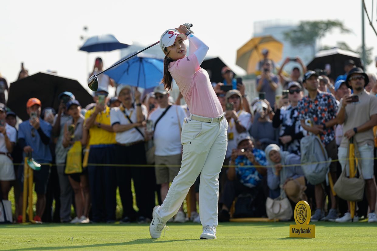 Choi Hye-Jin of South Korea tees off on the first hole during the LPGA Tour's Maybank Championship at Kuala Lumpur Golf and Country Club in Kuala Lumpur, Malaysia, Sunday, Nov. 2, 2025. -- AP Photo/Kien Huo