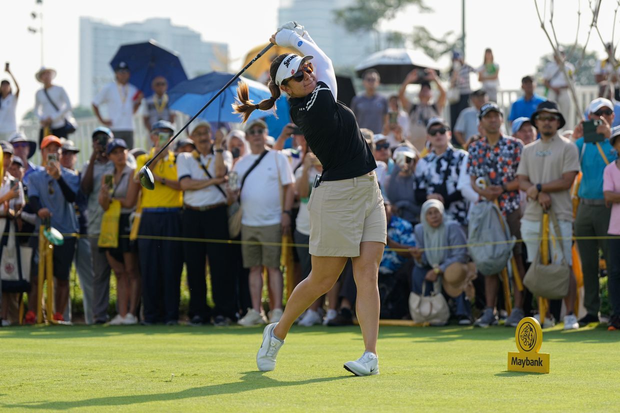 Hannah Green of Australia tees off on the first hole during the LPGA Tour's Maybank Championship at Kuala Lumpur Golf and Country Club in Kuala Lumpur, Malaysia, Sunday, Nov. 2, 2025. -- AP Photo/Kien Huo