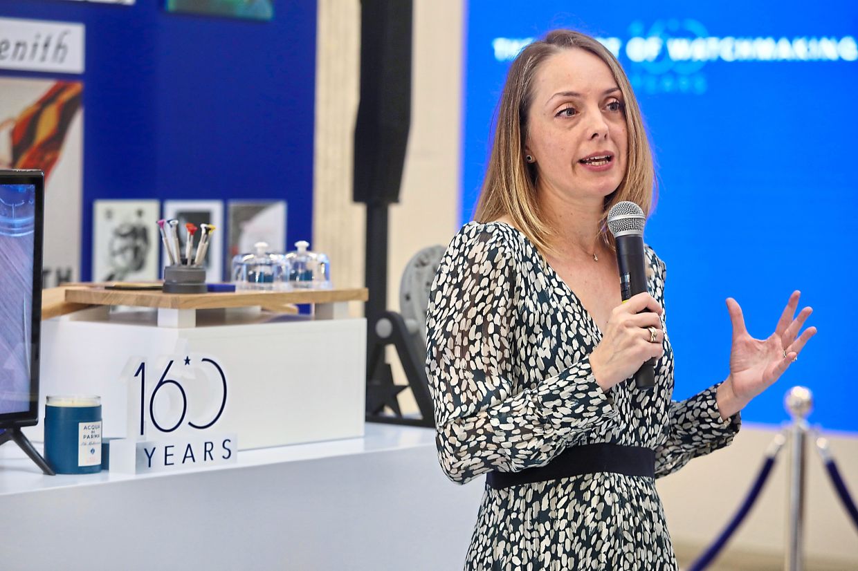 Bruyer speaking at the pop-up show launch.