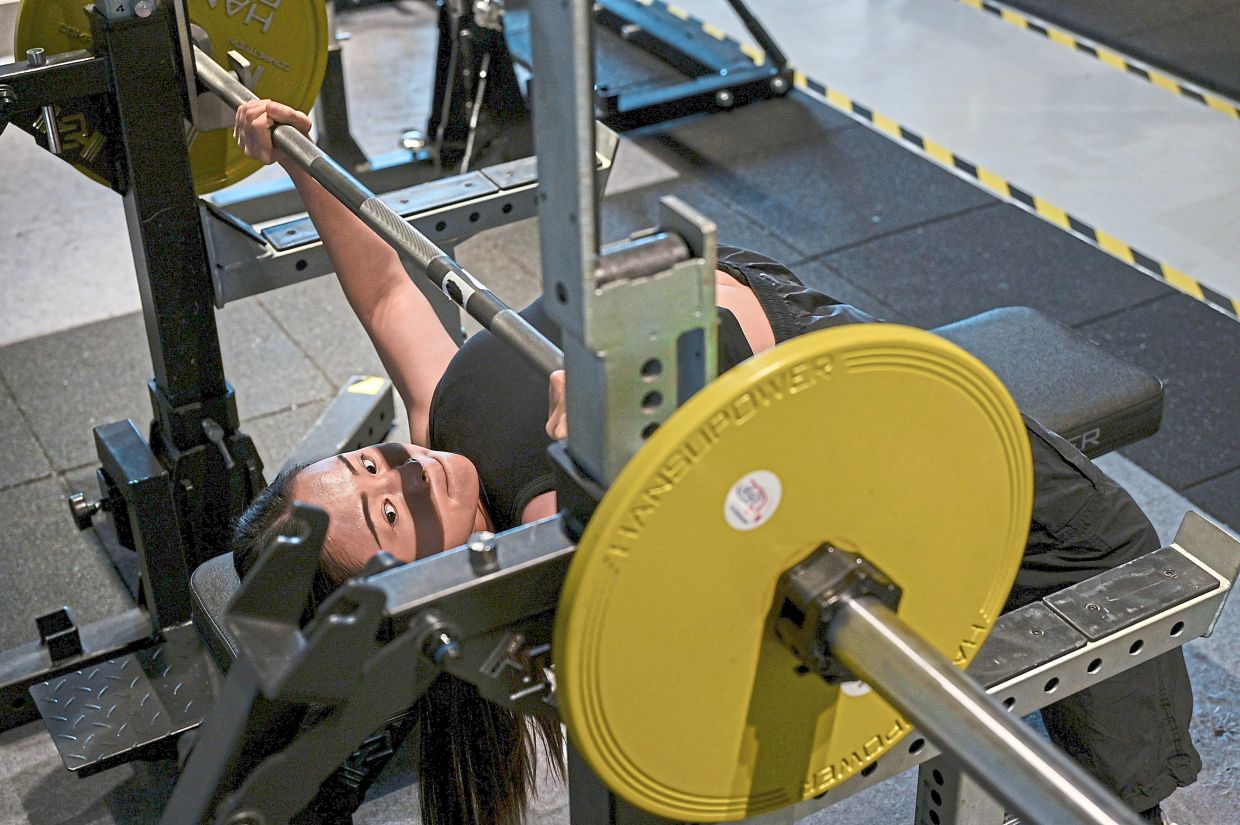 Women weightlifters face many misconceptions and stigmas. — Photos: Bernama