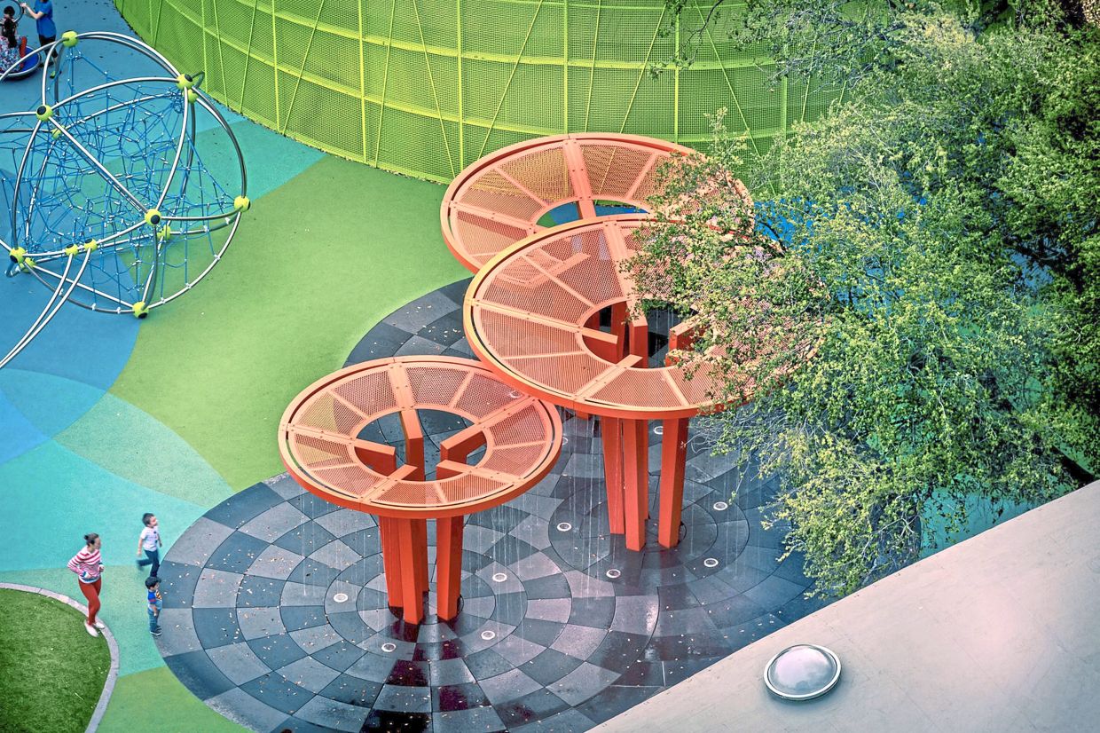 (Above and below) Artist impressions of circular shades and an outdoor jungle gym as part of the redesign plan for public parks in Klang. — Courtesy of MBDK