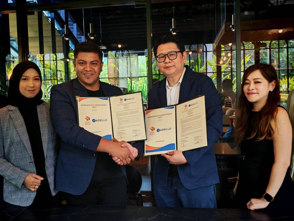 (from left): CEO NKMH, Nissa Rosli, COO Hafiz Che Yahya, after signing the MOU with Kelvin Tan, Managing Director, and Hilary How, Regional Director, Adello Malaysia