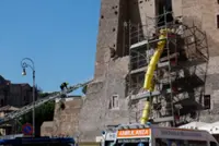 Worker trapped under collapsed medieval tower in Rome dies