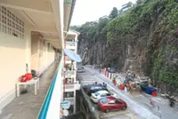 Six vehicles hit by hillside rockfalls