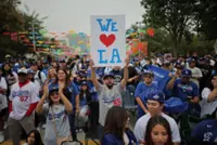 Baseball-Ohtani teases 'three-peat' as Dodgers parade draws Los Angeles crowds