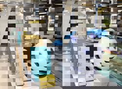 Japan's Narita Airport opens unmanned souvenir shop with cat-like robot