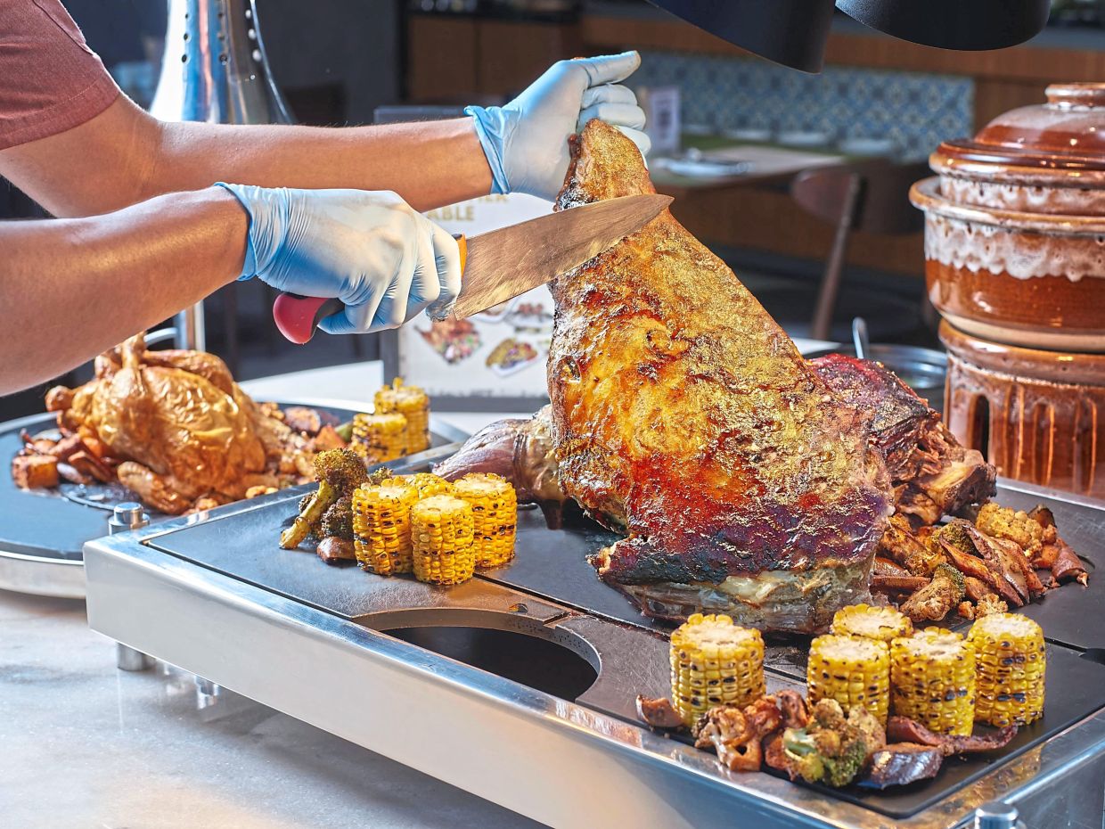 The juicy Roasted Lamb Leg is available during its Sunday Roast Brunch. — Courtesy photos