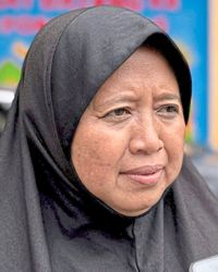 Kamsinah believes discipline is important when children are introduced to technology.