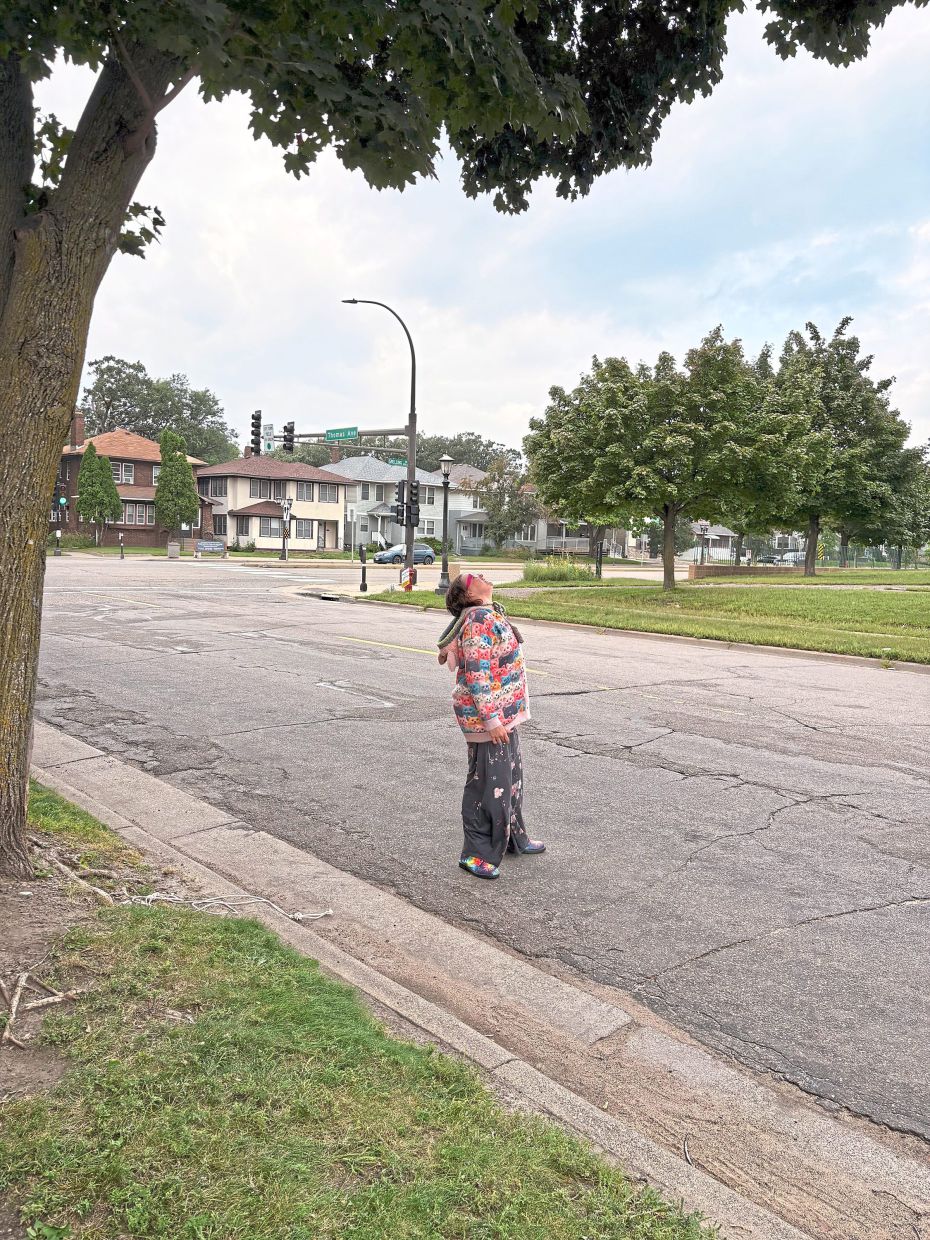 Aiken searching for her missing parrot. — Photos: The Minnesota Star Tribune/TNS