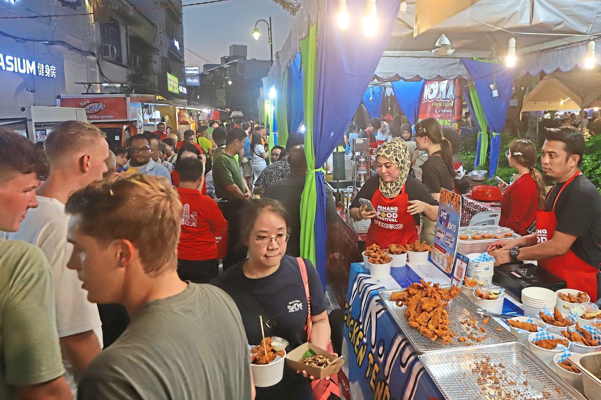 Visitors choosing ‘dim sum’ at a stall.