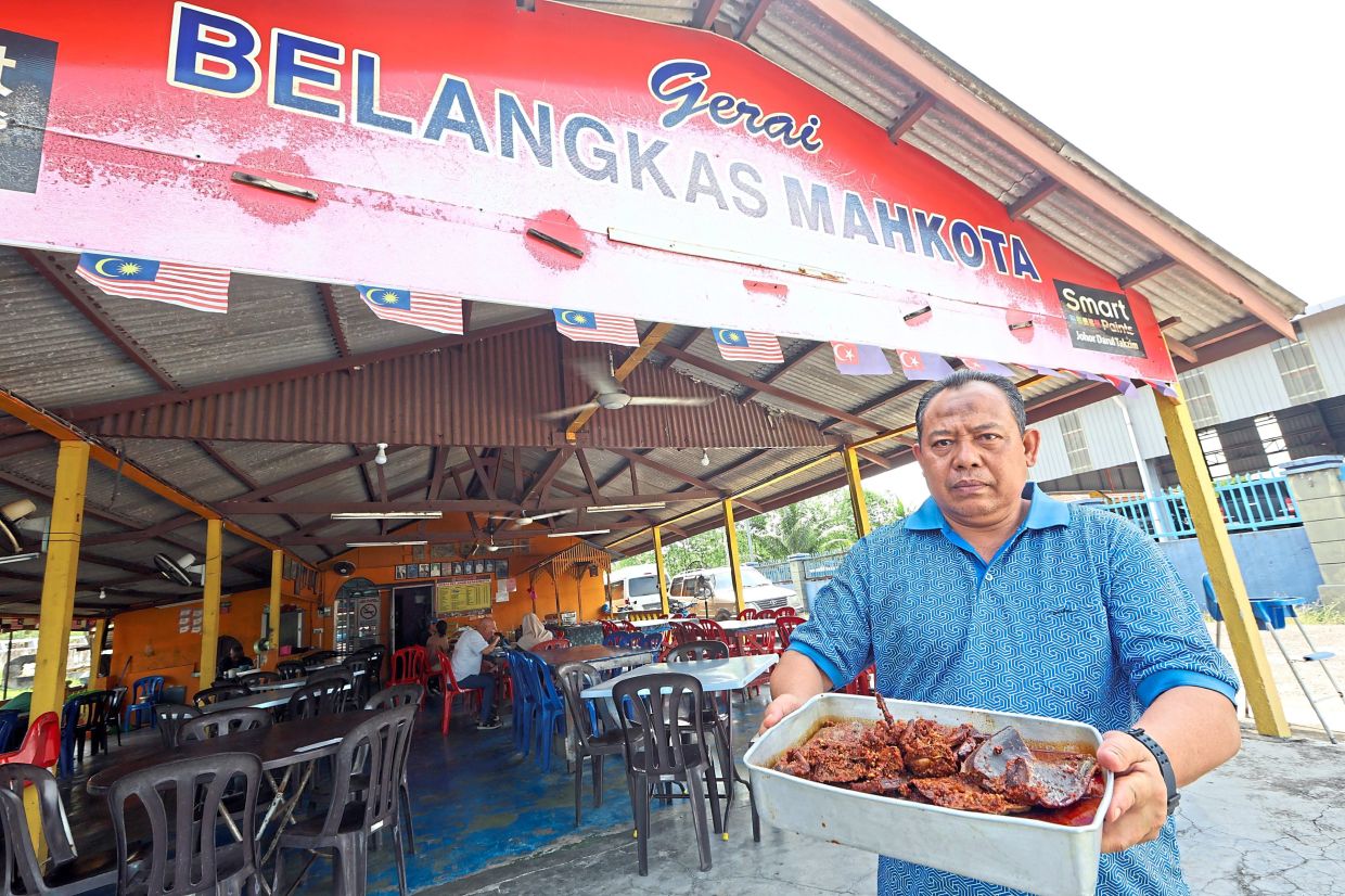 Mohd Khair with the sambal horseshoe crab at his restaurant in Kota Tinggi.