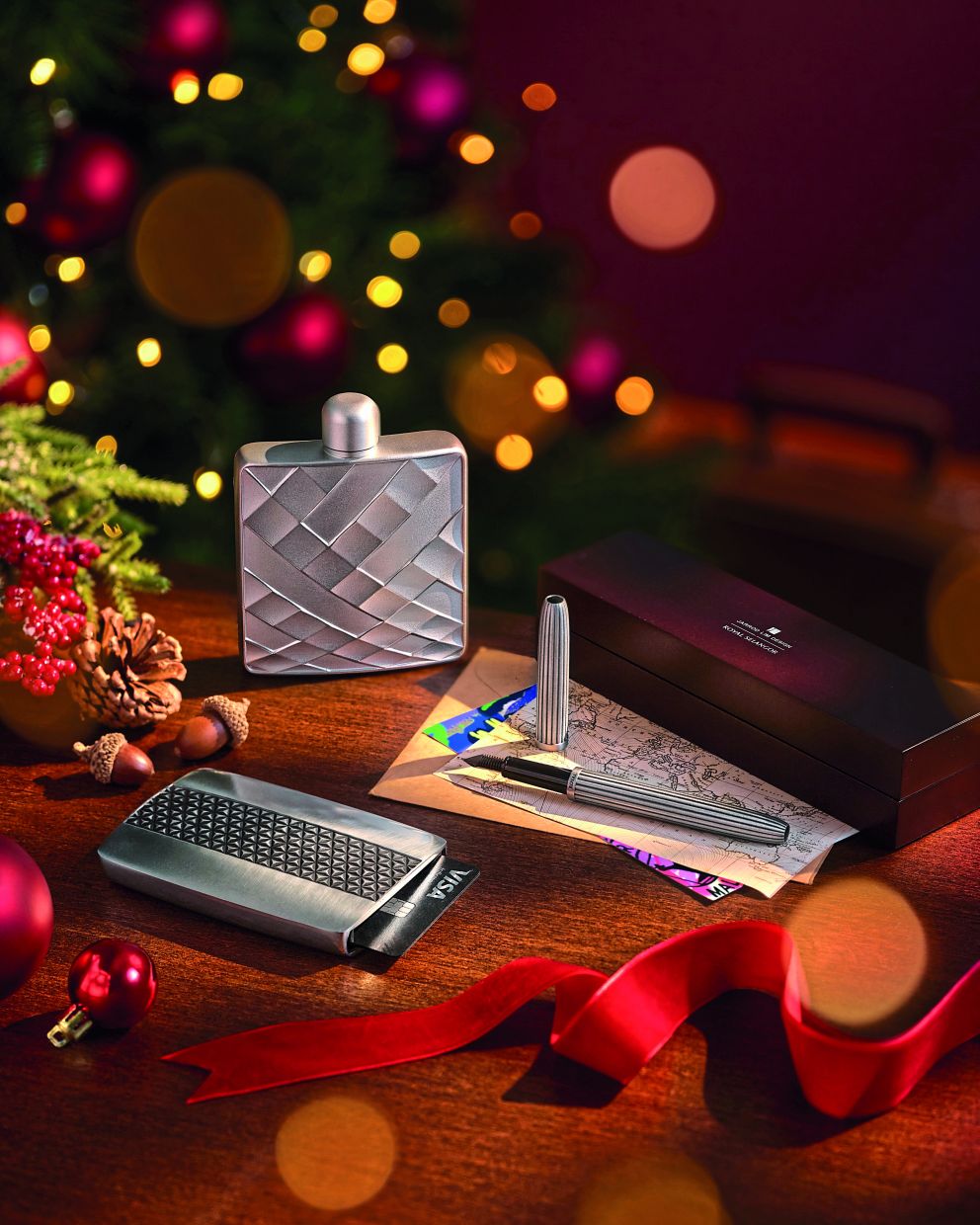 The Frost Hipflask fits neatly into a bag, ready to share a small toast on the go, while the Savoy Broad Nibbed Fountain Pen and Solus Card Wallet slip effortlessly into a pocket.