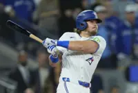 Baseball-From sofa to stardom: Blue Jays hero's pull-out couch on public display