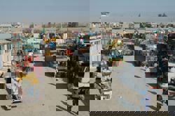 Afghanistan and Pakistan exchange fire as peace talks begin