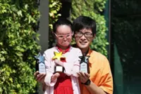 Singapore girl with rare skin condition and no hands among 30 winners of  community integration awards