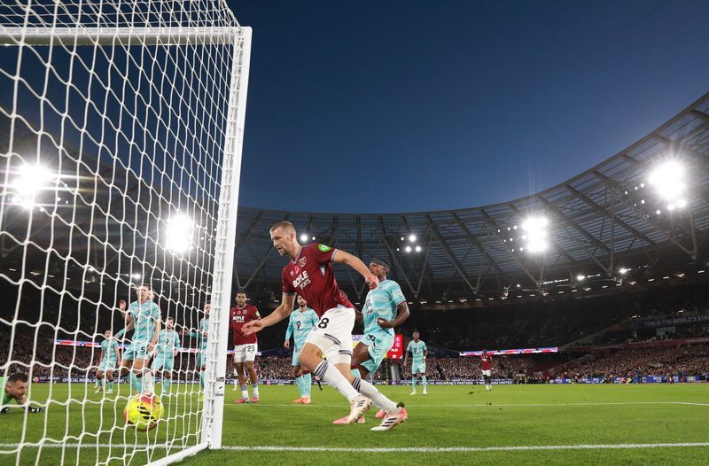 Soccer-West Ham roar back to beat Burnley 3-2