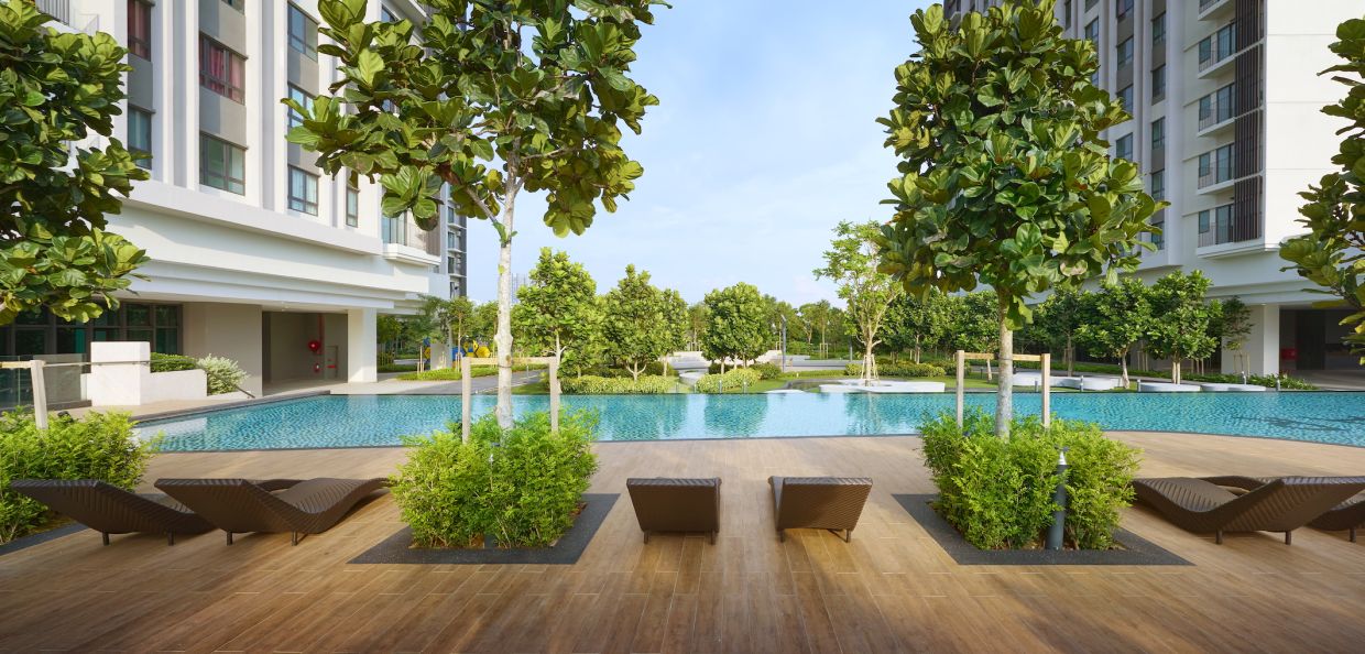 The development features lush green spaces and a comprehensive facility podium.