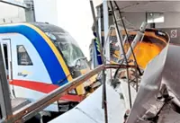 Empty KTM Komuter train overshoots track