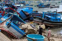Typhoon Kalmaegi rampages across Vietnam; many homes flattened and at least five people confined killed