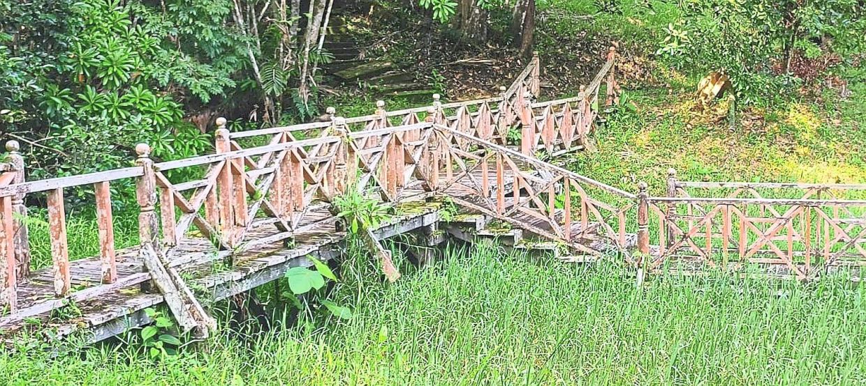 The wooden walkway, once a favourite photo spot at Sebangkoi, now appears worn and neglected.