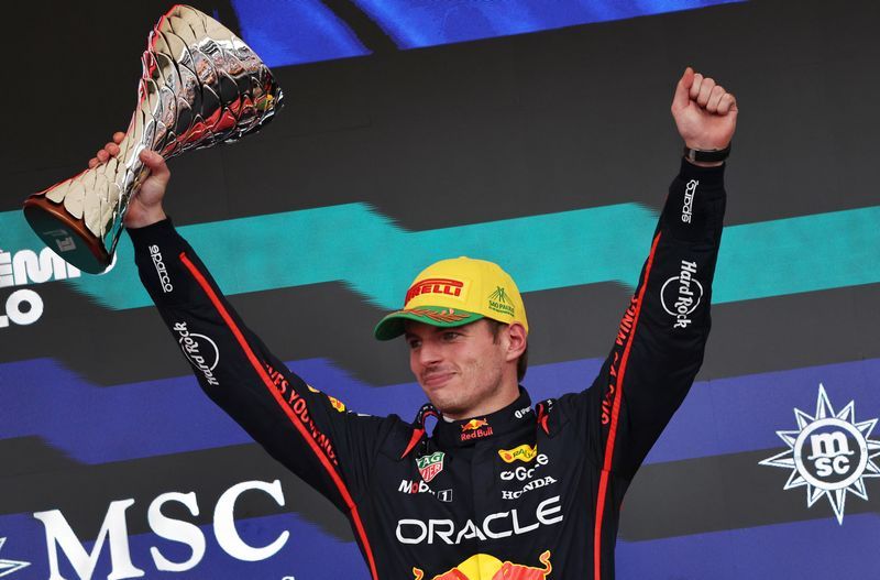 Motor racing-Sensational Verstappen charges from pitlane to podium