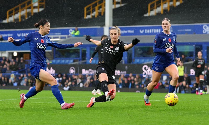 Soccer-Man City women climb past Chelsea to first in WSL table