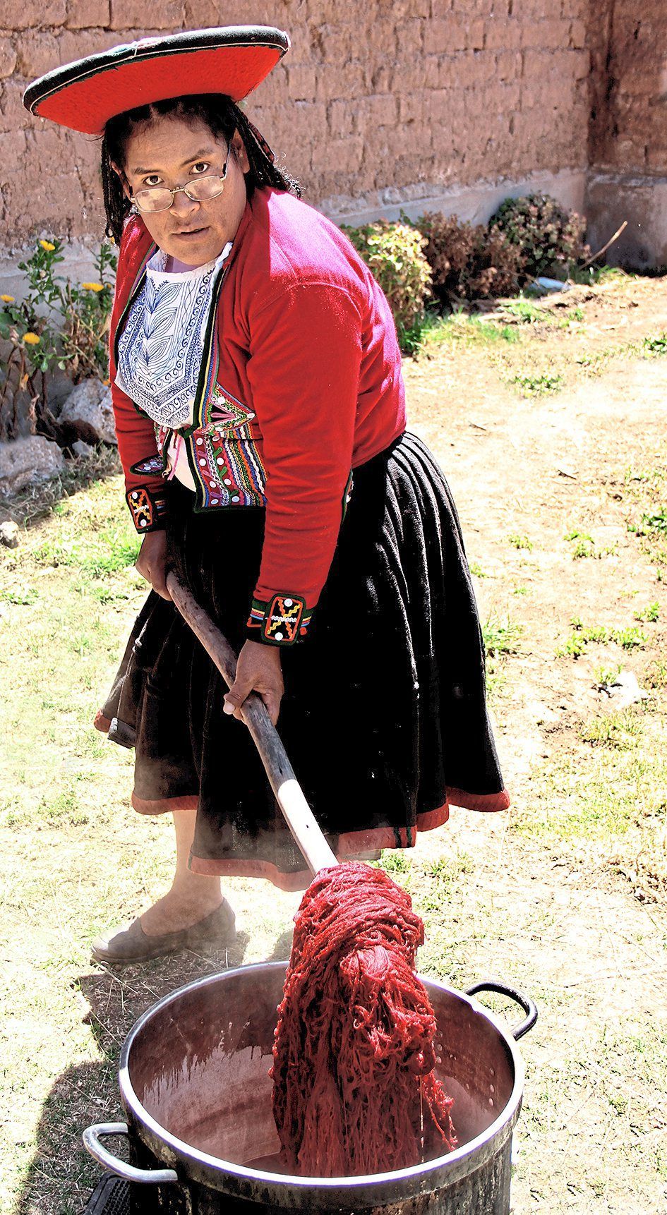 The weavers use natural dyes such as from cochineal beetles.