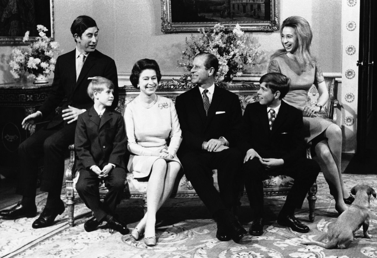 In this Nov 20, 1972 file photo, Britain's Queen Elizabeth II and Prince Philip are surround by their family in Buckingham Palace, in London, on the occasion of the royal couples silver wedding. From left in the picture are shown: Prince Charles, Prince Edward, the youngest child (aged 8), the Queen, Prince Philip, Prince Andrew (aged 12) and Princess Anne, (22). Photo: AP