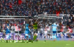 Soccer-Napoli fall in Bologna as top of the table remains tight