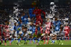 Soccer-Man City ease to 3-0 win over Liverpool as Guardiola celebrates 1,000th game in style