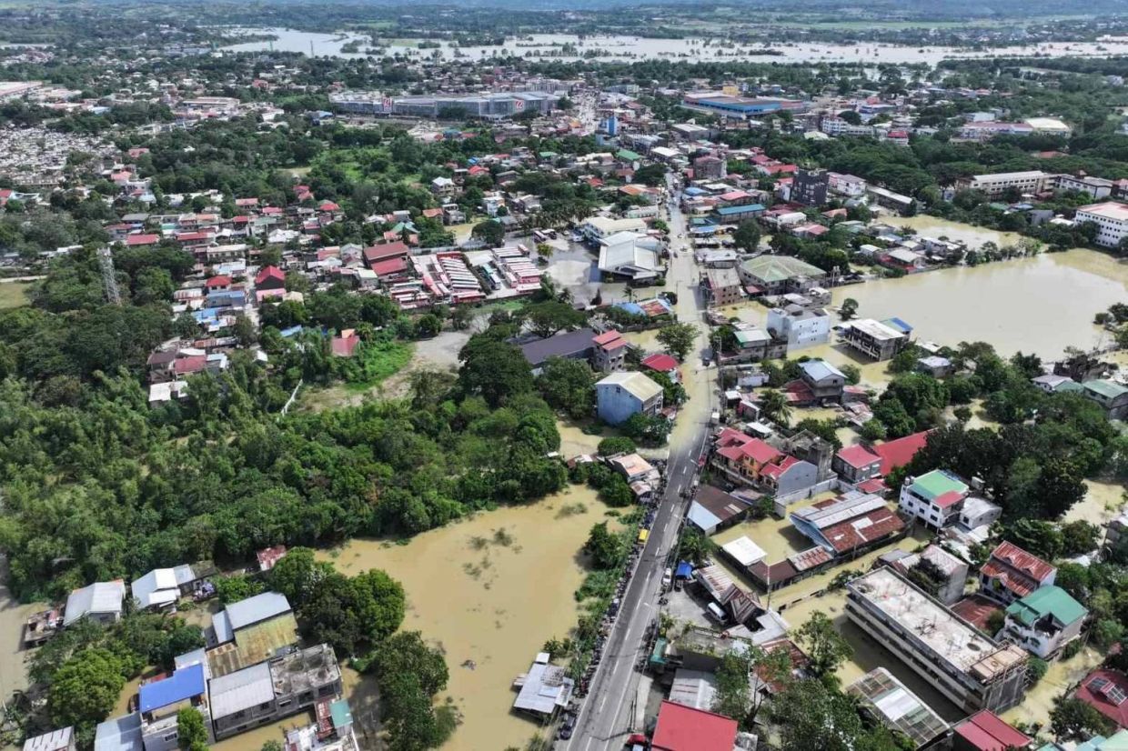 In this photo provided by the Cagayan Police Provincial Office, a town is surrounded by floodwaters after the onslaught of Typhoon Fung-wong in Cagayan province, northern Philippines, on Tuesday, November 11, 2025. -- Cagayan Police Provincial Office via AP