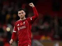 Soccer-Liverpool face huge uphill battle after City loss, says Robertson