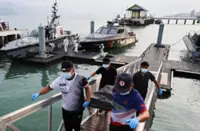 Death toll from capsized boat with Myanmar migrants climbs to 26 as more bodies recovered