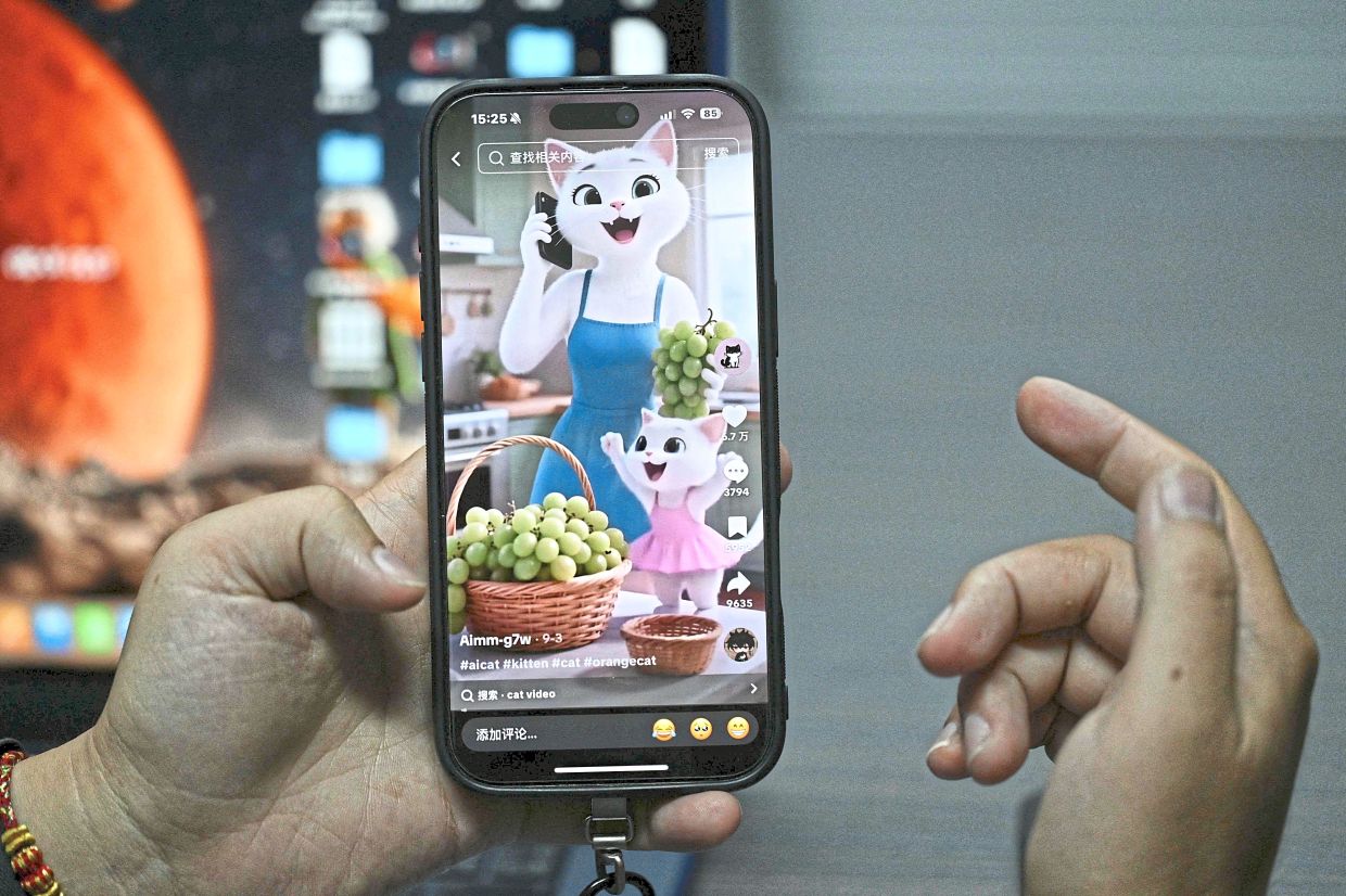 Content generated by the AIpai platform is seen on a smartphone. — AFP