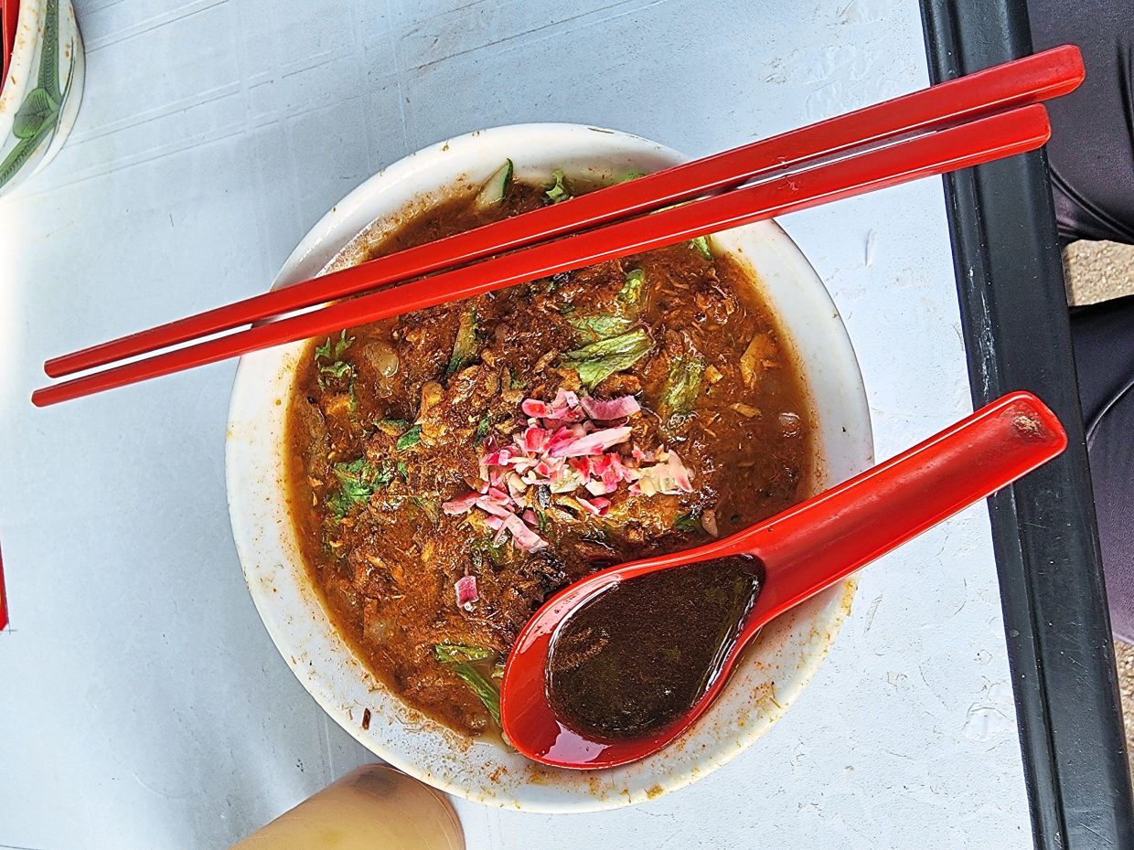 Kim’s assam laksa features a thick, rich fish broth laced with just the right amount of tanginess.