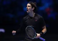 Tennis-Musetti battles 'until the end' to remain at ATP Finals