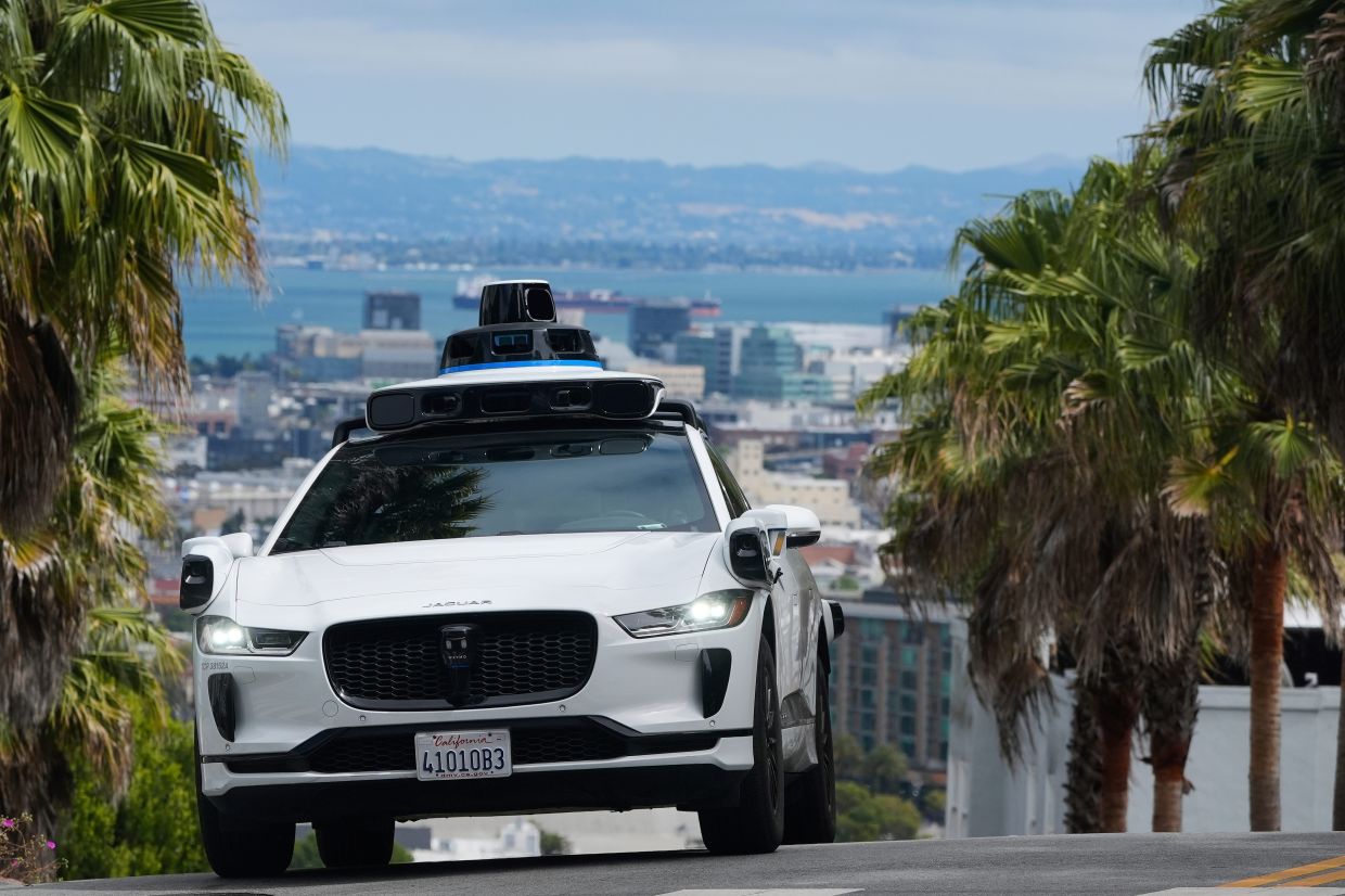 Waymo is hitting US highways. Here's what to know about the robotaxi's ...