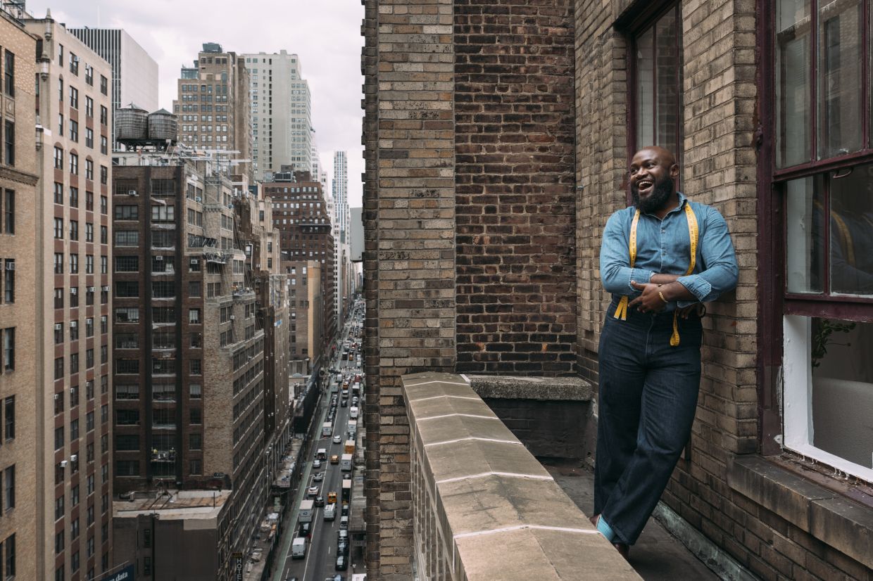 Wedding dress designer Charles Dieujuste outside his studio loft in the garment district in Manhattan. Photo: The New York Times