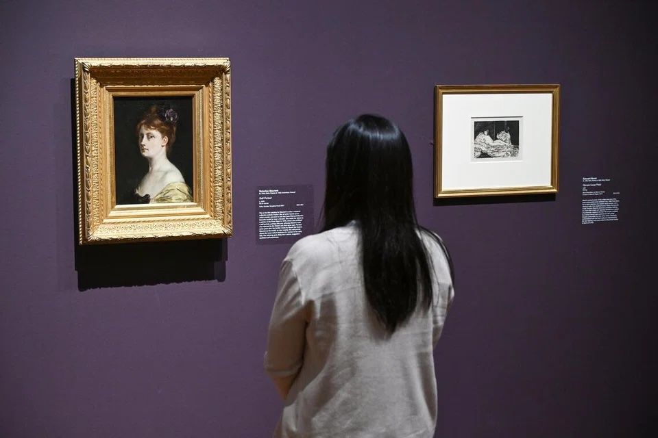 Victorine Meurent’s Self Portrait (left) and Edouard Manet’s Olympia at National Gallery Singapore’s Impressionism show. — Photo: SHINTARO TAY/The Straits Times/Asia News Network