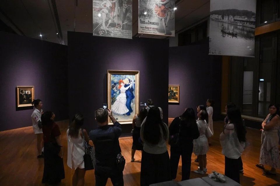 Pierre-Auguste Renoir’s Dance At Bougival is one of the key pieces at the Impressionism show. — Photo: SHINTARO TAY/The Straits Times/Asia News Network