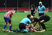 Soccer-Collision leaves Atletico's Medina with head injury