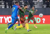 Soccer-Mbemba snatches late winner as Congolese march on in World Cup playoffs